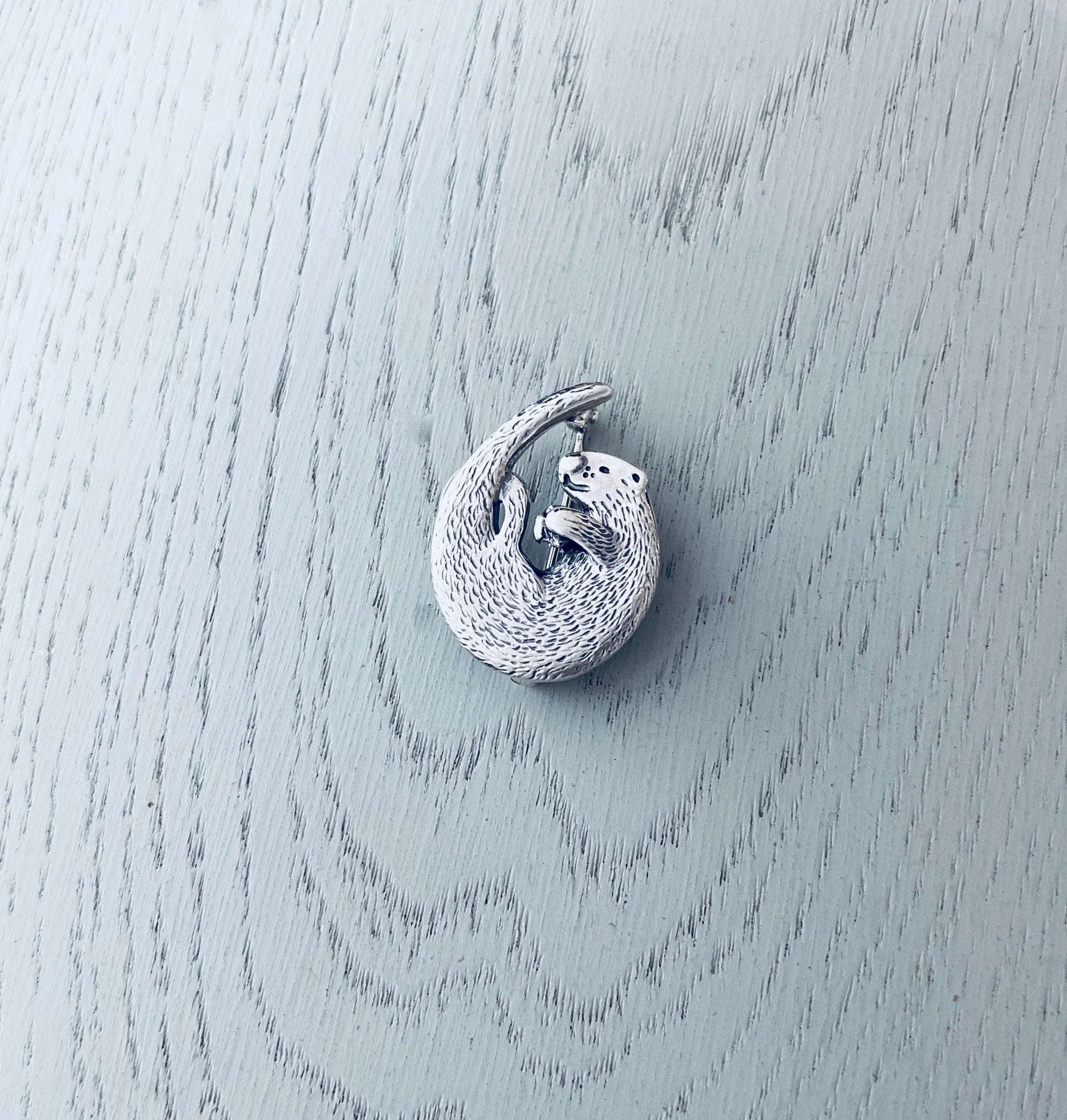 Otter brooch best sale