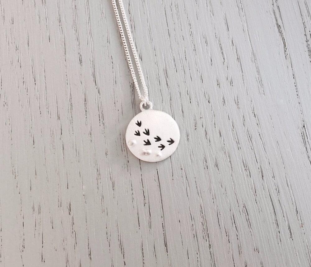bird prints in the sand pendant