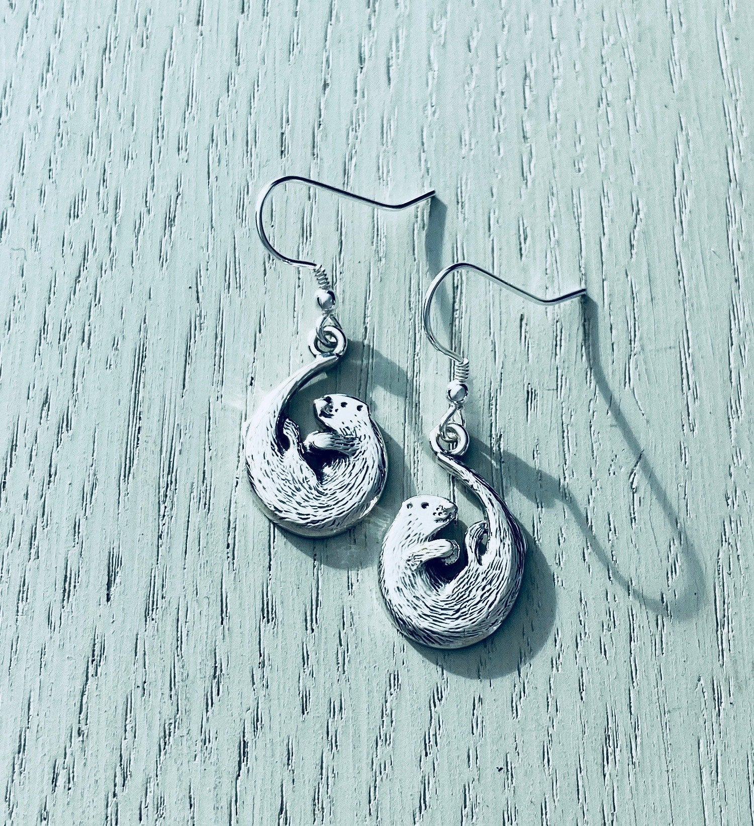Otter earrings sale